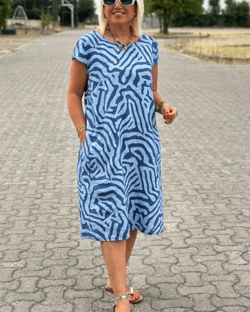Nelia™ - Summer dress with a round neck and a beautiful print
